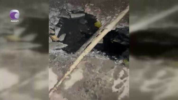 İnsanlar qorxu içində - Bakıda küçəyə axıdılan maddə nədir? - VİDEO