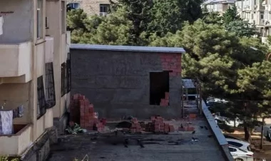 Yasamalda çoxmərtəbəli binada qanunsuz artırılan eyvan söküldü - FOTO