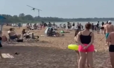 Çimərliyə yaxın məsafədən uçan təyyarənin pilotu saxlanıldı - VİDEO