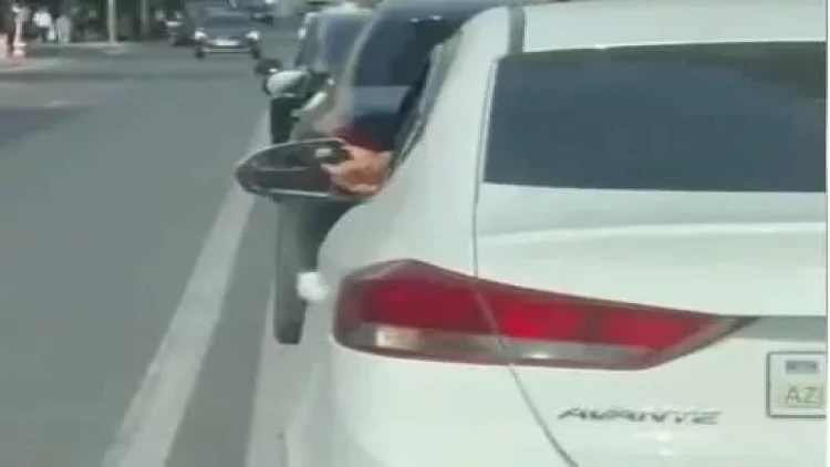 Sürücü oyuncaq silahla təşviş yaratdı - Həbs edildi - VİDEO