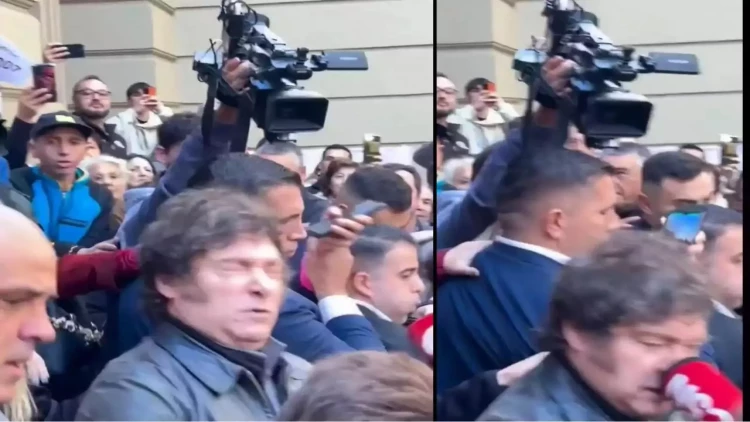 Jurnalist Argentina prezidentini mikrofonla vurdu - VİDEO