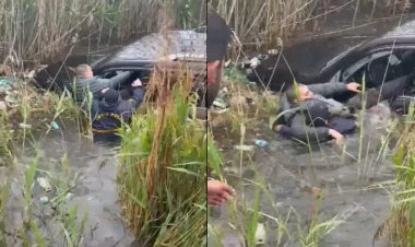 Bakıda polis bataqlığa düşən sürücünü belə xilas etdi - VİDEO