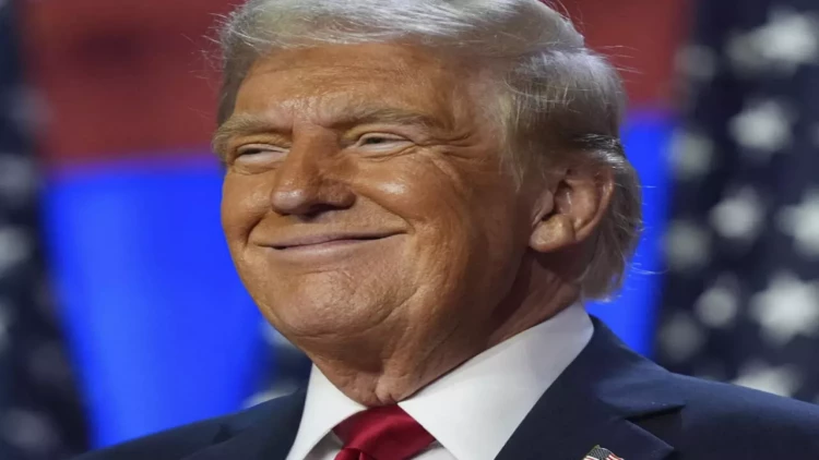 Tramp bu portretinə ağız büzdü: Obamanı çəkib, əla görünür, məni isə... - FOTO