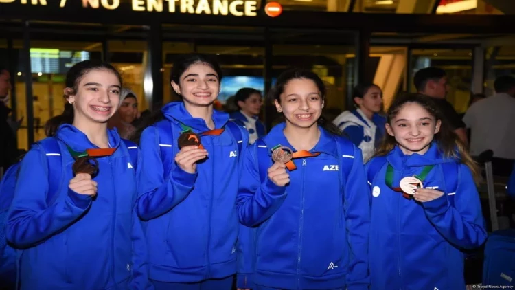 Gimnastlarımız vətənə qayıtdı - FOTO