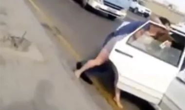 Qadını maşına zorla mindirdilər - Əri və oğlu saxlanıldı