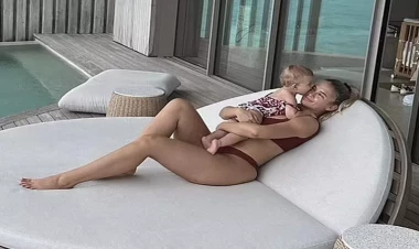 Qucağında körpəsi ilə bikinili FOTOlar çəkdirdi