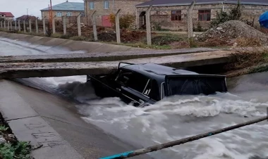 Qubada avtomobil su kanalına düşdü - FOTO