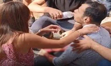 Hər kəsin gözü qarşısında qızının sevgilisinin boğazını kəsdi - VİDEO - FOTO