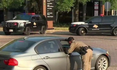 Ticarət mərkəzinin yaxınlığında atışma, ölən və yaralananlar var