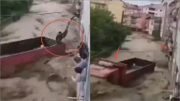 Ölümlə həyat arasında: Türkiyəli gənc seldən son saniyədə xilas oldu - VİDEO