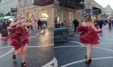 Bakının mərkəzində qəribə geyimdə gəzən qız kimdir? - VİDEO